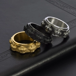 Vintage stainless steel spinning crown rings in gold, black, and silver for men