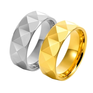 Polished gold and silver tungsten rings with geometric diamond faceted surface