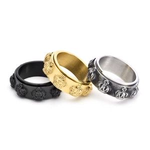 Three-piece set of spinning crown rings for men in black, gold, and antique silver finish