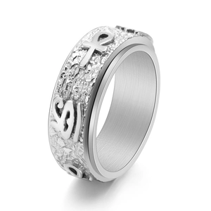 Hammered stainless steel spinner ring featuring Ankh cross and Eye of Horus relief