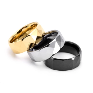 Modern geometric tungsten steel rings featuring diamond-cut facets in gold, silver, and black