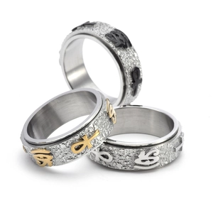 Rotating Ankh and Eye of Horus titanium steel rings with textured rock finish