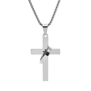 Detailed view of silver cross pendant with a central ring on a sturdy box chain