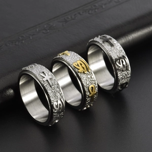 Gothic Ankh and Eye of Horus spinner rings in silver, gold, and black finishes