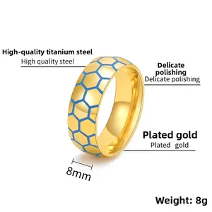 Macro view of 8mm gold-plated titanium steel ring with blue honeycomb pattern detail