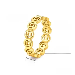 Macro detail of 5mm 18K gold plated titanium steel ring with traditional coin patterns