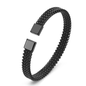 Detail of black woven stainless steel mesh open cuff bracelet with polished end caps