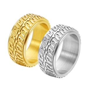Rotating stainless steel tire tread ring in gold and silver finish for men