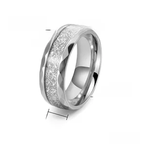 Detail showing 8mm silver titanium steel ring with faceted edges and frosted inlay