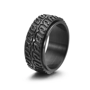 Men's rotatable black stainless steel ring featuring textured car tire tread pattern