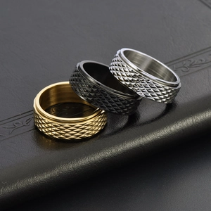 Three-piece titanium steel spinner rings with diamond-cut pattern in gold black and silver
