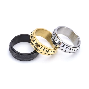 Three-piece set of spinning Norse Viking rune rings in black, gold, and silver stainless steel