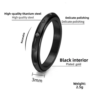 Close-up of 3mm black rotatable titanium steel ring with pyramid rivet texture surface