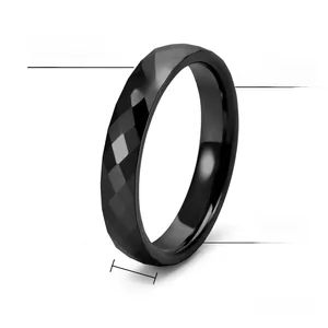 Macro view of 4mm black tungsten steel ring featuring a faceted diamond-cut surface