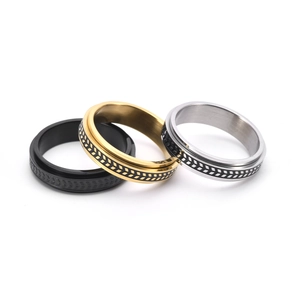 Rotating stainless steel olive leaf rings set in black, gold and silver finishes