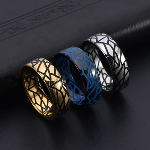 Set of vintage stainless steel rings in gold, blue, and silver with crackle texture