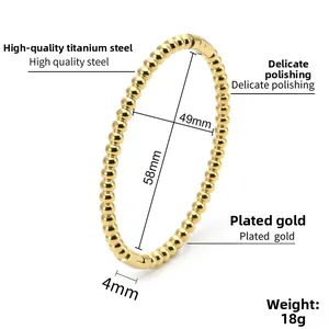 Detail showing 4mm beads on an 18K gold titanium steel bangle with 58mm inner diameter