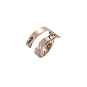 Polished rose gold spiral ring for men with Keep Fucking Going black laser engraving