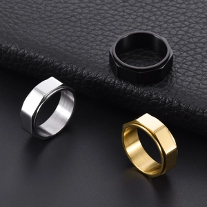 Three-piece set of hexagonal industrial nut rings in silver, gold, and black finishes