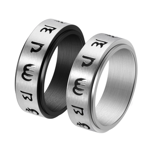 Rotating stainless steel spinner ring with brushed finish and Sanskrit mantra engraving