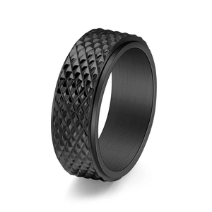 Black titanium steel rotating ring with textured diamond pattern for stress relief