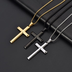 Three-piece set of polished stainless steel cross necklaces in gold, silver, and black