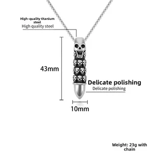 Close-up of punk style skull bullet pendant in silver stainless steel with dimensions