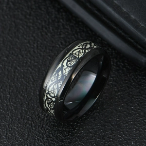 Luminous dragon pattern ring in black stainless steel with green celtic knot inlay