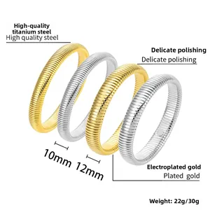 Detail of 10mm and 12mm elastic titanium steel bangles in gold and silver finish