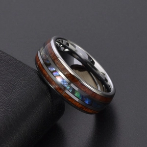 Polished tungsten ring featuring wood inlay and iridescent abalone shell for men
