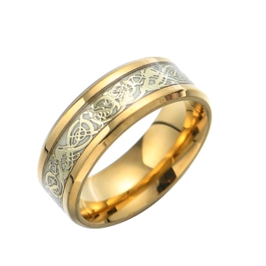Macro detail of gold titanium ring featuring white Celtic knot patterns and tribal design