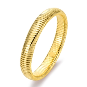 Detail of 18K gold-plated stainless steel tubogas bracelet with flexible striped texture