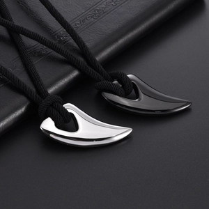 Men's titanium steel wolf tooth pendants in black and silver with braided ropes