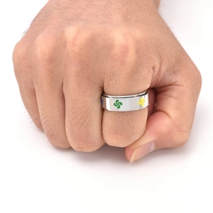 Close-up of a silver titanium spinning ring with colorful Lauburu motifs on fingers
