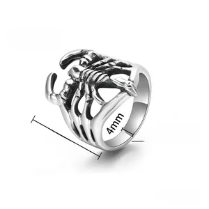 Macro side view of vintage scorpion ring made of cast stainless steel with punk details
