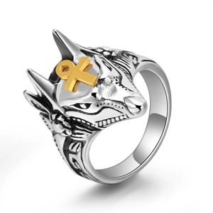 Vintage stainless steel Anubis wolf head ring with gold Ankh symbol on white background