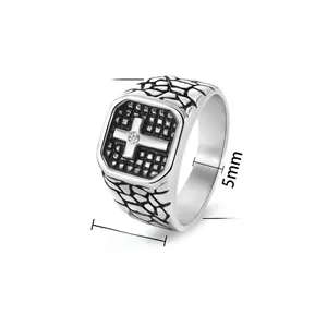 Close-up of vintage steel cross ring with 13mm face width and crocodile texture details