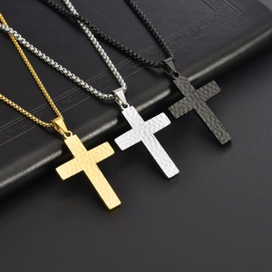Handcrafted hammered cross pendant necklaces for men in gold, silver, and black colors