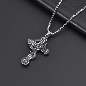 Gothic dragon wrapped around cross with skull pendant on vintage steel box chain