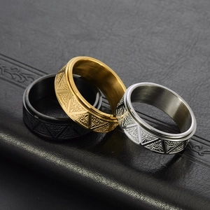 Black, gold and silver stainless steel spinner rings with Eye of Providence engraving