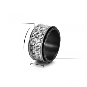 Macro detail of 12mm rotating titanium steel ring with engraved Chinese scripture