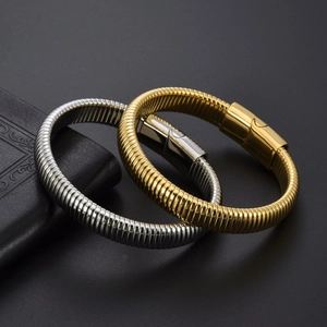 Bracciali da uomo in acciaio al titanio con chiusura magnetica in oro e argento