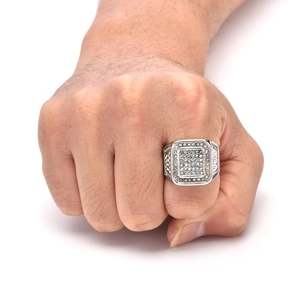 Macro shot of silver hip hop square ring with micro-paved cubic zirconia stones