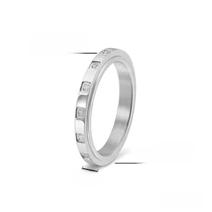 Macro shot of 3mm stainless steel spinning ring with cubic zirconia stones and brushed finish