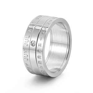 Rotating stainless steel calendar ring with silver finish and sparkling zircon inlay