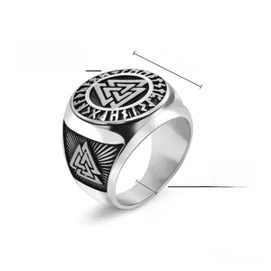 Macro detail showing Viking Valknut and Rune engravings on 6mm wide titanium steel ring band