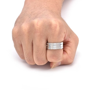Detail view of rotatable titanium steel calendar ring with engraved dates and months