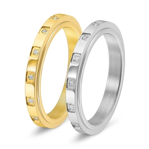 Rotating 18K gold and silver rings with inlaid diamonds and brushed metal finish