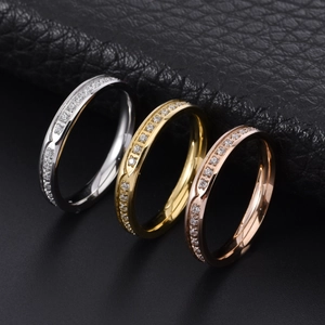 Polished stainless steel zircon channel set rings in silver, gold, and rose gold colors