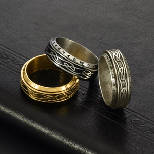 Set of Viking runes rings with Celtic knot patterns in gold, silver, and black finishes